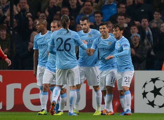 Sergio - Kun - Aguero of Manchester City celebrates his second goal (2ndR) - UEFA Champions League Group D - Manchester City vs CSKA Moscow - Etihad Stadium - Manchester - England - 05 11 13 - EDITORIAL USE ONLY. No use with unauthorised audio, video, data, fixture lists, club league logos or live services. Online in-match use limited to 120 images, no video emulation. No use in betting, games or single club league player publications.