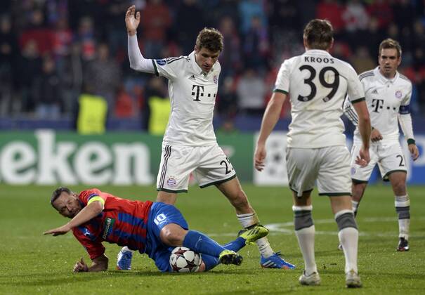 Left to right: Pavel Horvath (Plzen) and Thomas Müller and Toni Kroos (both Bayern) are pictured during their 4th round of the Champions League group D soccer match FC Viktoria Plzen vs. FC Bayern Munich in Pilsen, Czech Republic, November 5, 2013. (CTKxPhoto MichalxKamaryt) CTKPhotoP201311050848701  _KMT4489