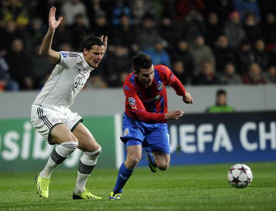 Michal Duris (Plzen, right) and Daniel van Buyten (Bayern) are pictured during their 4th round of the Champions League group D soccer match FC Viktoria Plzen vs. FC Bayern Munich in Pilsen, Czech Republic, November 5, 2013. (CTKxPhoto PetrxEret) CTKPhotoP201311050847101  ert 3