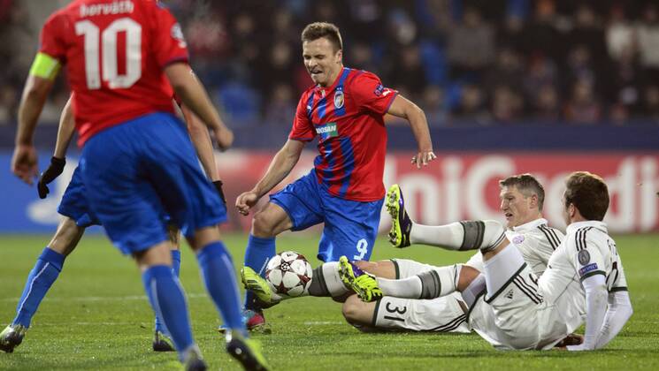 Left to right: Roman Adamov (Plzen) and Bastian Schweinsteiger and Mario Götze (both Bayern) are pictured during their 4th round of the Champions League group D soccer match FC Viktoria Plzen vs. FC Bayern Munich in Pilsen, Czech Republic, November 5, 2013. (CTKxPhoto MichalxKamaryt) CTKPhotoP201311050857501  kmt 2