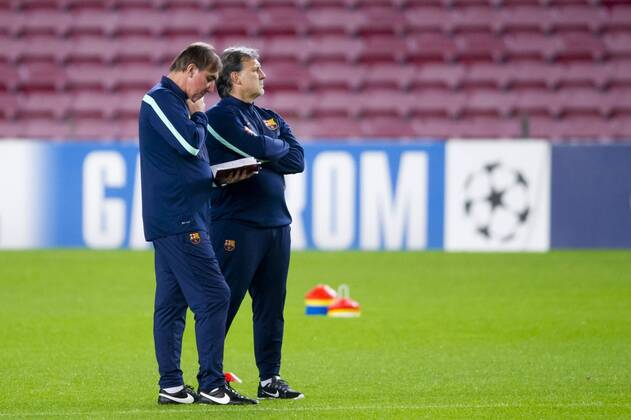 FC Barcelona s second coach Jorge Pautasso (left) and coach Gerardo Tata Martino (right) during a training session at Camp Nou in Barcelona. November 5, 2013.  (20131105119)