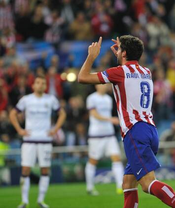 Atletico de Madrid Midfielder, number 8 RAUL GARCIA - Raul Garcia Escudero (26), celebrates after scoring a goal (2-0) - Champions league, soccer match between Atletico de Madrid - FK Austria Wien at the Vicente Calderon estadium, Madrid - Spain by November 6, 2013. GregorioxLopez. 