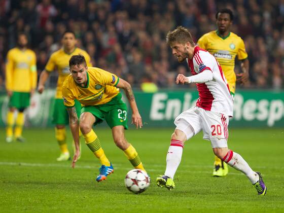 (L-R) Mikael Lustig of Celtic FC, Lasse Schone of Ajax during the Champions League match between Ajax Amsterdam and Celtic FC on November 06, 2013 at the Amsterdam Arena in Amsterdam, The Netherlands. Ajax v Celtic FC UEFA Champions League 2013 2014 xVIxxIVx 1891420