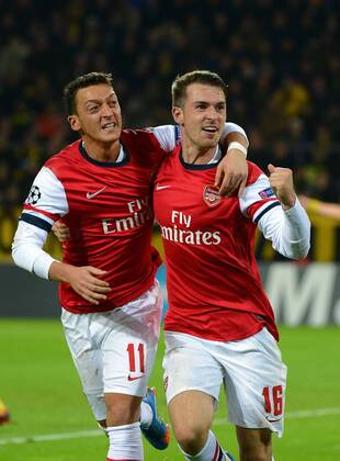 06.11.2013, xjhx, Fussball Champions League, Borussia Dortmund - Arsenal London, v.l. Mesut Özil (Arsenal London), Aaron Ramsey (Arsenal London) Torjubel, Goal celebration, celebrate the goal 0:1