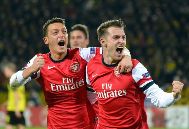 06.11.2013, xjhx, Fussball Champions League, Borussia Dortmund - Arsenal London, v.l. Mesut Özil (Arsenal London), Aaron Ramsey (Arsenal London) Torjubel, Goal celebration, celebrate the goal 0:1