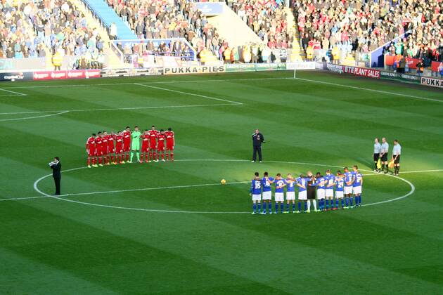 Leicester City v Nottingham Forest . . Leicester, UK . . 10.11.2013 The last post is played during the minutes silence after the matchball was delivered to the King Power Stadium by RAF helicopter, on the Saturday before Remembrance Sunday.