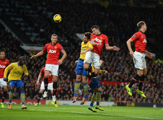 Robin van Persie of Manchester United scores the first goal - Barclays Premier League - Manchester United (ManU) vs Arsenal FC London - Old Trafford Stadium - Manchester - England - 10 11 13 - EDITORIAL USE ONLY. No use with unauthorised audio, video, data, fixture lists, club league logos or live services. Online in-match use limited to 120 images, no video emulation. No use in betting, games or single club league player publications.