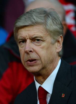 Arsene Wenger manager of Arsenal - Barclays Premier League - Manchester United (ManU) vs Arsenal FC London - Old Trafford Stadium - Manchester - England - 10 11 13 - EDITORIAL USE ONLY. No use with unauthorised audio, video, data, fixture lists, club league logos or live services. Online in-match use limited to 120 images, no video emulation. No use in betting, games or single club league player publications.