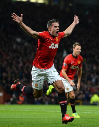 Robin van Persie of Manchester United celebrates his goal - Barclays Premier League - Manchester United (ManU) vs Arsenal FC London - Old Trafford Stadium - Manchester - England - 10 11 13 - EDITORIAL USE ONLY. No use with unauthorised audio, video, data, fixture lists, club league logos or live services. Online in-match use limited to 120 images, no video emulation. No use in betting, games or single club league player publications.