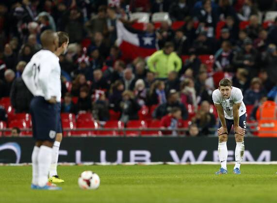 England s Gary Cahill looks on dejected after going 2-0 down - England v Chile - International Friendly - Wembley Stadium - London - England -15 11 2013 - Pic David Klein Sportimage EDITORIAL USE ONLY. No use with unauthorised audio, video, data, fixture lists, club league logos or live services. Online in-match use limited to 120 images, no video emulation. No use in betting, games or single club league player publications.