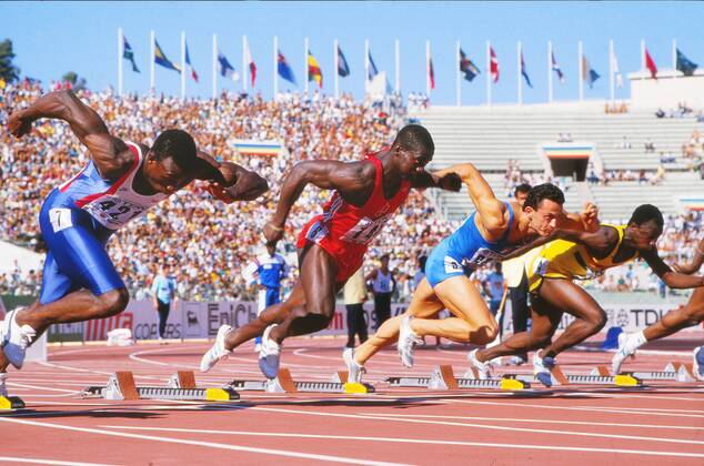 Athletics - 1987 IAAF Rome World Championships - Men s 100m Heats Canada s Ben Johnson (red) and Great Britain s Linford Christie, left, at the Stadio Olimpico. 29 08 1987 