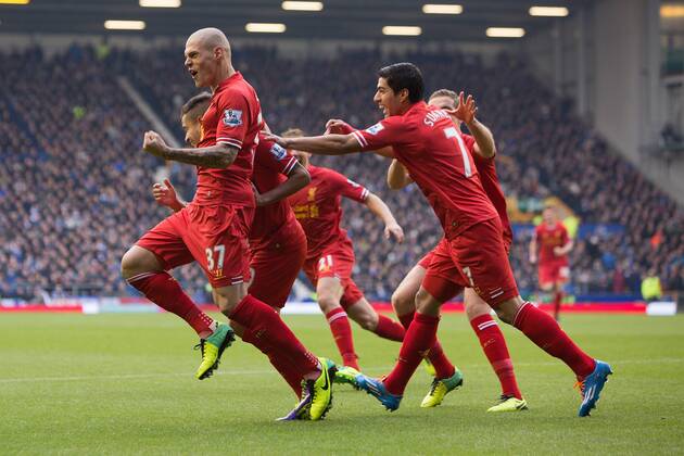 Martin Skrtel of Liverpool celebrates with opening goalscorer Phillipe Coutinho- Everton vs. Liverpool - Barclays Premier League - Goodison Park - Liverpool - 23 11 2013 Pic Philip Oldham Sportimage EDITORIAL USE ONLY. No use with unauthorised audio, video, data, fixture lists, club league logos or live services. Online in-match use limited to 120 images, no video emulation. No use in betting, games or single club league player publications.