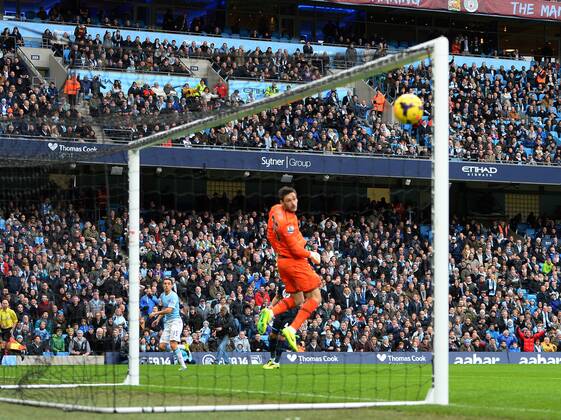 Jesus Navas of Manchester City scores the first goal - Barclays Premier League - Manchester City vs Tottenham Hotspur - Etihad Stadium - Manchester - England - 24th November 2013 - EDITORIAL USE ONLY. No use with unauthorised audio, video, data, fixture lists, club league logos or live services. Online in-match use limited to 120 images, no video emulation. No use in betting, games or single club league player publications.