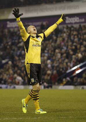 Aston Villa goalkeeper Brad Guzan celebrates his side s second goal - Football - Barclays Premiership - West Bromwich Albion vs Aston Villa - The Hawthorns West Bromwich - November 25th 2013 - Season 2013 14 Credit: Malcolm Couzens Sportimage EDITORIAL USE ONLY. No use with unauthorised audio, video, data, fixture lists, club league logos or live services. Online in-match use limited to 120 images, no video emulation. No use in betting, games or single club league player publications.