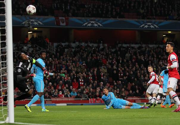 Arsenal s Jack Wilshere scores his sides opening goal Arsenal FC London v Olympique Marseille - Champions League - Emirates Stadium - London - 26 11 2013 - EDITORIAL USE ONLY. No use with unauthorised audio, video, data, fixture lists, club league logos or live services. Online in-match use limited to 120 images, no video emulation. No use in betting, games or single club league player publications.
