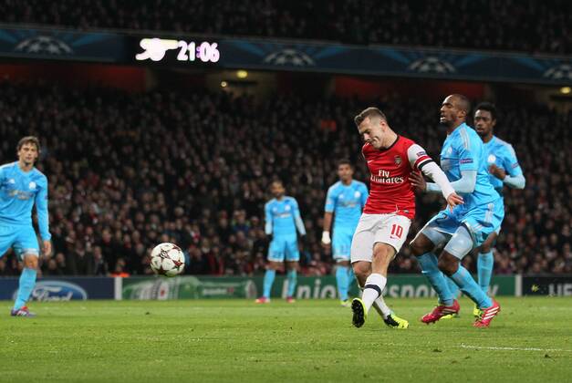 Arsenal s Jack Wilshere scores his second goal Arsenal FC London v Olympique Marseille - Champions League - Emirates Stadium - London - 26 11 2013 - EDITORIAL USE ONLY. No use with unauthorised audio, video, data, fixture lists, club league logos or live services. Online in-match use limited to 120 images, no video emulation. No use in betting, games or single club league player publications.