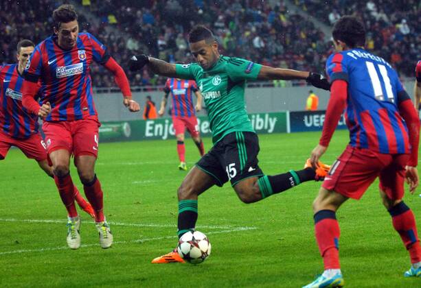 26.11.2013 Bucharest(Romania) FC Steaua - FC Schalke 04 UEFA Champions League men s football Dennis Aogo(c) FC Schalke 04 and Lukasz Szukala(L) FC Steaua :Stringer 