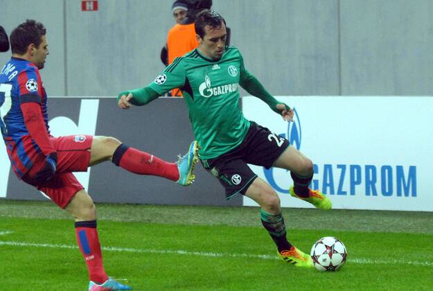 26.11.2013 Bucharest(Romania) FC Steaua - FC Schalke 04 UEFA Champions League men s football Christian Fuchs(R) FC Schalke 04 and Adrian Popa(L) FC Steaua :Stringer 