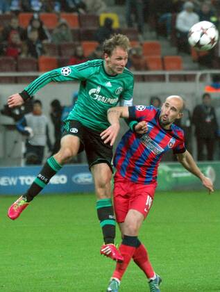 26.11.2013 Bucharest(Romania) FC Steaua - FC Schalke 04 UEFA Champions League men s football Benedikt Höwedes(L) FC Schalke 04 and Iasmin Latovlevici(r) FC Steaua :Stringer 