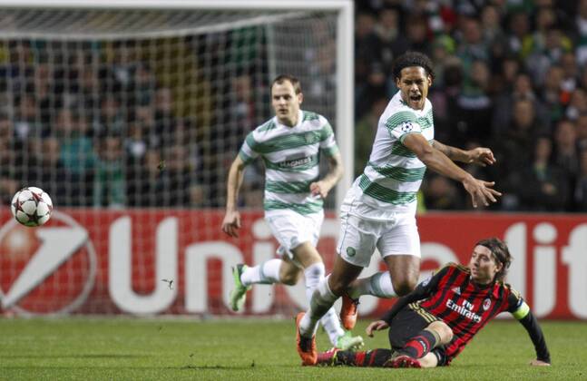 26.11.2013 Glasgow, Scotland. Riccardo Montolive tackles Virgil van Dijk during the Champions League game between Celtic and AC Milan from Celtic Park. xVagelisxGeorgarioux  ActionPlus20158241