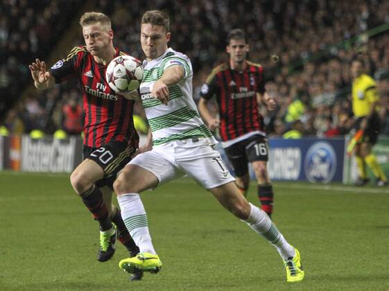 26.11.2013 Glasgow, Scotland. Derk Boerrigter challenges Ignazio Abate during the Champions League game between Celtic and AC Milan from Celtic Park. xVagelisxGeorgarioux  ActionPlus20158236