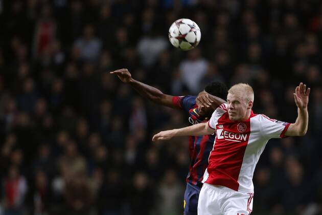 (L-R) Alex Song of FC Barcelona, Davy Klaassen of Ajax during the Champions League match between Ajax Amsterdam and FC Barcelona on November 26, 2013 at the Amsterdam Arena in Amsterdam, The Netherlands. Ajax v FC Barcelona UEFA Champions League 2013 2014 xVIxLaurensxLindhoutxIVx 1924408