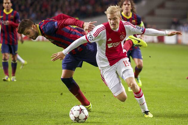 (L-R) Pedro Rodriguez of FC Barcelona, Gerard Pique of FC Barcelona, Nicolai Boilesen of Ajax, Carles Puyol of FC Barcelona during the Champions League match between Ajax Amsterdam and FC Barcelona on November 26, 2013 at the Amsterdam Arena in Amsterdam, The Netherlands. Ajax v FC Barcelona UEFA Champions League 2013 2014 xVIxxIVx 1924443