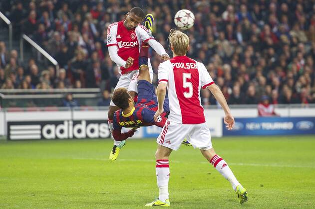 (L-R) Stefano Denswil of Ajax, Neymar of FC Barcelona, Christian Poulsen of Ajax during the Champions League match between Ajax Amsterdam and FC Barcelona on November 26, 2013 at the Amsterdam Arena in Amsterdam, The Netherlands. Ajax v FC Barcelona UEFA Champions League 2013 2014 xVIxxIVx 1924498