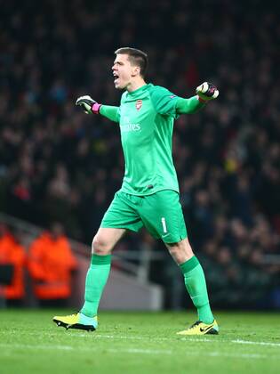 Arsenal s Wojciech Szczesny celebrates his team second goal Football - UEFA Champions League - Group F - 2nd Leg - Arsenal FC London v Olympique Marseille - 26th November 2013 - Emirates Stadium - London - UK MZE13_Arsenal_v_Marseille