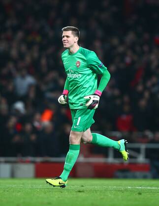 Arsenal s Wojciech Szczesny celebrates his team second goal Football - UEFA Champions League - Group F - 2nd Leg - Arsenal FC London v Olympique Marseille - 26th November 2013 - Emirates Stadium - London - UK MZE14_Arsenal_v_Marseille