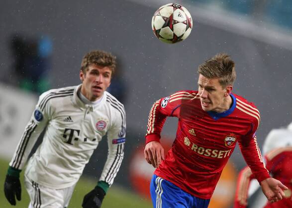 ITAR-TASS: MOSCOW, RUSSIA. NOVEMBER 27, 2013. CSKAâ€™s Pontus Wernbloom (red) in their UEFA Champions League Group Stage game CSKA Moscow vs. Bayern Munich.  RE131B47