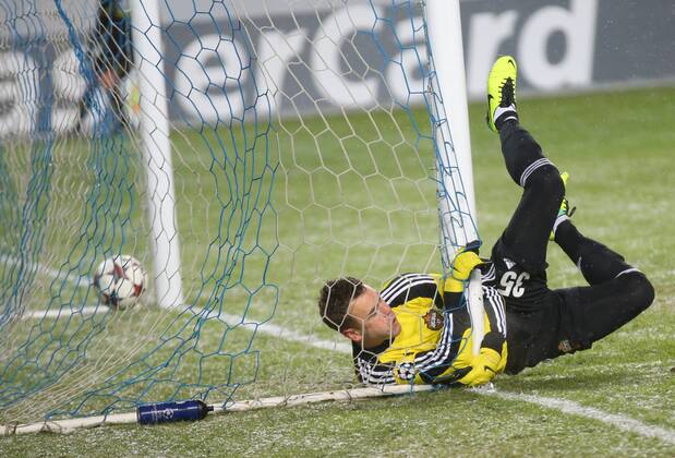 ITAR-TASS: MOSCOW REGION, RUSSIA. NOVEMBER 27, 2013. CSKAâ€™s goalie Igor Akinfeev allows a goal during a UEFA Champions League Group Stage game CSKA Moscow vs. Bayern Munich.  RE131B45