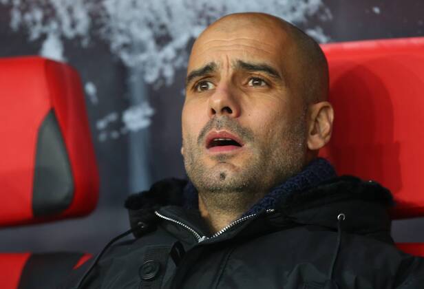 ITAR-TASS: MOSCOW REGION, RUSSIA. NOVEMBER 27, 2013. Bayern s head coach Josep Guardiola watches a UEFA Champions League Group Stage game CSKA Moscow vs. Bayern Munich.  RE131B46