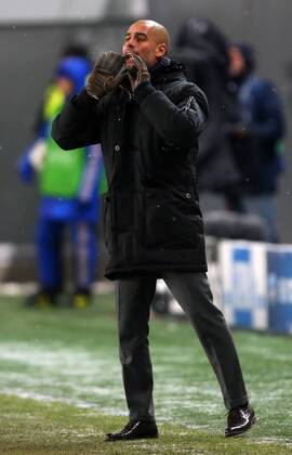 ITAR-TASS: MOSCOW REGION, RUSSIA. NOVEMBER 27, 2013. Bayern s head coach Josep Guardiola shouts during a UEFA Champions League Group Stage game CSKA Moscow vs. Bayern Munich.  RE131B49