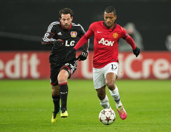 Gonzalo Castro of Leverkusen chases Nani of Manchester United - Bayer Leverkusen vs. Manchester United - UEFA Champions League - Bay Arena - Leverkusen - 27 11 2013 Pic Philip Oldham Sportimage EDITORIAL USE ONLY. No use with unauthorised audio, video, data, fixture lists, club league logos or live services. Online in-match use limited to 120 images, no video emulation. No use in betting, games or single club league player publications.