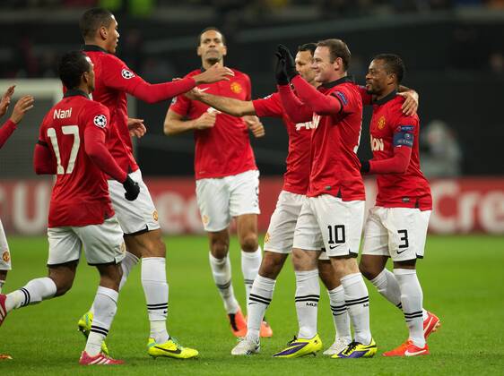 Wayne Rooney of Manchester United celebrates his sides second goal - Bayer Leverkusen vs. Manchester United - UEFA Champions League - Bay Arena - Leverkusen - 27 11 2013 Pic PhilipxOldham Sportimage EDITORIAL USE ONLY. No use with unauthorised audio, video, data, fixture lists, club league logos or live services. Online in-match use limited to 120 images, no video emulation. No use in betting, games or single club league player publications.