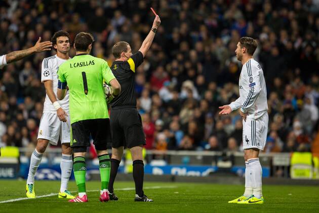 MADRID, ESPANA - 27 DE NOVIEMBRE 2013: referee William Collum - Sergio Ramos Real Madrid - Galatasaray Istanbul Estadio Santiago Bernabeu (Photo:SergioLopez Cordonpress) 
