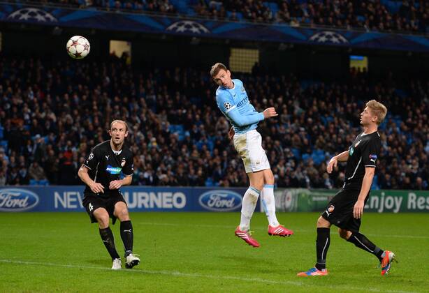 Edin Dzeko of Manchester City scores the fourth goal - UEFA Champions League Group D - Manchester City vs FC Viktoria Plzen - Etihad Stadium - Manchester - England- 27th November 2013 - Picture Simon Bellis Sportimage EDITORIAL USE ONLY. No use with unauthorised audio, video, data, fixture lists, club league logos or live services. Online in-match use limited to 120 images, no video emulation. No use in betting, games or single club league player publications.