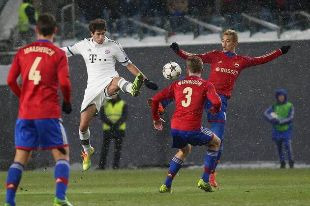 November 27, 2013. Russia, Khimki, arena New Khimki. CSKA s player Keisuke Honda and Bayern s player Thomas Müller in the 2013 14 UEFA Champions League s group stage match between CSKA Moscow and FC Bayern München - DmitryxGolubovich 