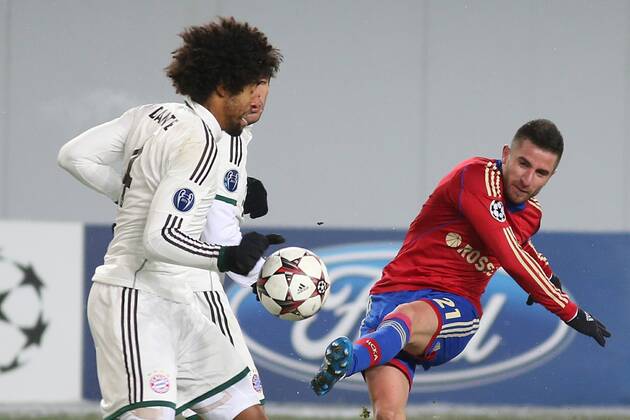 November 27, 2013. Russia, Khimki, arena New Khimki. CSKA s player Zoran Tosic and Bayern s player Dante Bonfim in the 2013 14 UEFA Champions League s group stage match between CSKA Moscow and FC Bayern München - DmitryxGolubovich 