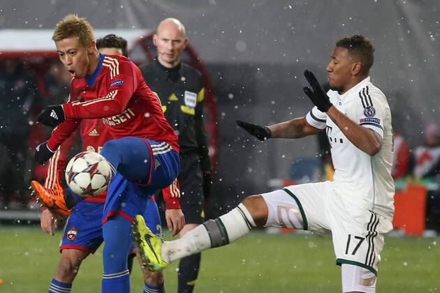 November 27, 2013. Russia, Khimki, arena New Khimki. CSKA s player Keisuke Honda and Bayern s player Jerome Boateng in the 2013 14 UEFA Champions League s group stage match between CSKA Moscow and FC Bayern München - DmitryxGolubovich 
