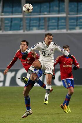 November 27, 2013. Russia, Khimki, arena New Khimki. CSKA s player Georgi Milanov and Bayern s player Marcio Rafinha in the 2013 14 UEFA Champions League s group stage match between CSKA Moscow and FC Bayern München - DmitryxGolubovich 
