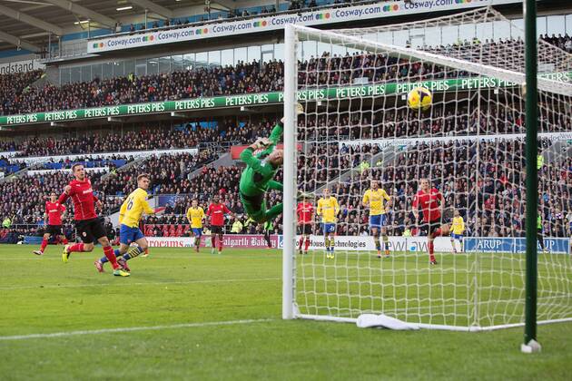 Arsenal s Aaron Ramsey scores the opening goal - Cardiff City vs. Arsenal FC London - Barclays Premier League - Cardiff City Stadium - Cardiff - 30 11 2013 EDITORIAL USE ONLY. No use with unauthorised audio, video, data, fixture lists, club league logos or live services. Online in-match use limited to 120 images, no video emulation. No use in betting, games or single club league player publications.