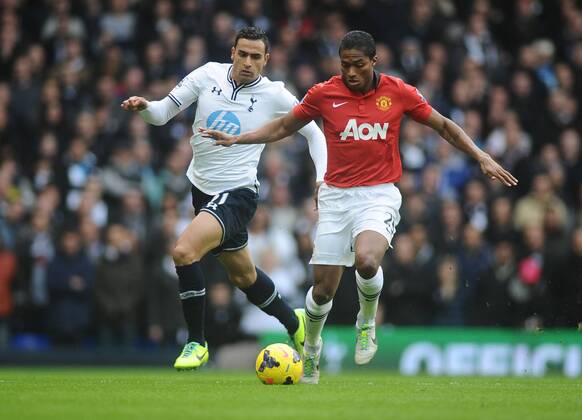Football - 2013 2014 Premier League - Tottenham Hotspur vs. Manchester United (ManU) Manchester s Antonio Valencia on the ball at White Hart Lane. Nacer Chadli - tottenham
