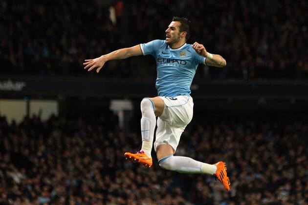Alvaro Negredo of Manchester City celebrates his opening goal - Manchester City vs. Swansea City - Barclays Premier League - Etihad Stadium - Manchester - 01 12 2013 Pic Philip Oldham Sportimage EDITORIAL USE ONLY. No use with unauthorised audio, video, data, fixture lists, club league logos or live services. Online in-match use limited to 120 images, no video emulation. No use in betting, games or single club league player publications.