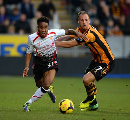 Raheem Sterling of Liverpool tussles with David Meyler of Hull City - Barclays Premier League - Hull City vs Liverpool - Kingston Communications Stadium - Hull - England - 1st December 2013 - Picture Simon Bellis Sportimage EDITORIAL USE ONLY. No use with unauthorised audio, video, data, fixture lists, club league logos or live services. Online in-match use limited to 120 images, no video emulation. No use in betting, games or single club league player publications.