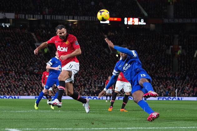 Ryan Giggs of Manchester United sends a header across goal - Manchester United vs. Everton - Barclays Premier League - Old Trafford - Manchester - 04 12 2013 Pic Philip Oldham Sportimage EDITORIAL USE ONLY. No use with unauthorised audio, video, data, fixture lists, club league logos or live services. Online in-match use limited to 120 images, no video emulation. No use in betting, games or single club league player publications.