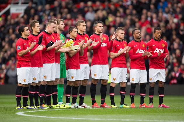 Manchester United applaud in memory of Nelson Mandela - Manchester United vs. Newcastle United - Barclays Premier League - Old Trafford - Manchester - 04 12 2013 EDITORIAL USE ONLY. No use with unauthorised audio, video, data, fixture lists, club league logos or live services. Online in-match use limited to 120 images, no video emulation. No use in betting, games or single club league player publications.