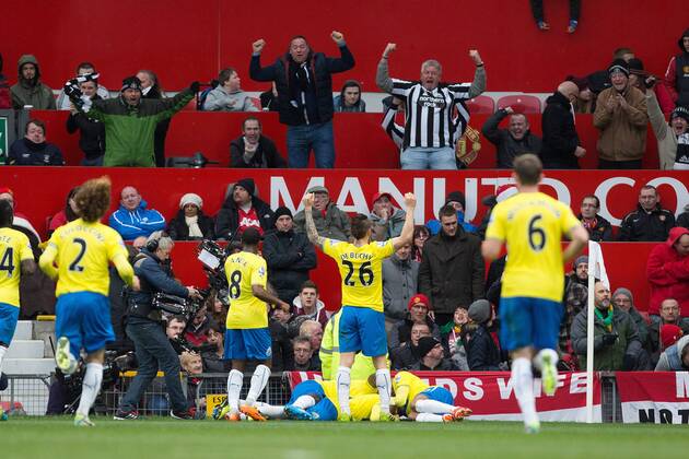 Newcastle celebrate Yohan Cabaye s opening goal - Manchester United vs. Newcastle United - Barclays Premier League - Old Trafford - Manchester - 04 12 2013 Pic Philip Oldham Sportimage EDITORIAL USE ONLY. No use with unauthorised audio, video, data, fixture lists, club league logos or live services. Online in-match use limited to 120 images, no video emulation. No use in betting, games or single club league player publications.