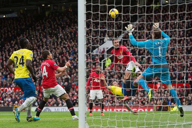 Robin van Persie of Manchester United heads the ball into the goal but has it ruled offside - Manchester United vs. Newcastle United - Barclays Premier League - Old Trafford - Manchester - 04 12 2013 Pic Philip Oldham Sportimage EDITORIAL USE ONLY. No use with unauthorised audio, video, data, fixture lists, club league logos or live services. Online in-match use limited to 120 images, no video emulation. No use in betting, games or single club league player publications.
